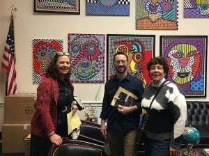 Board Member Anne Llewellyn and colleague Robin Boltz meet with Rep. Lois Frankel (FL-22-D) Legislative Director Ian Wolf to discuss the National Nurse Act 2019